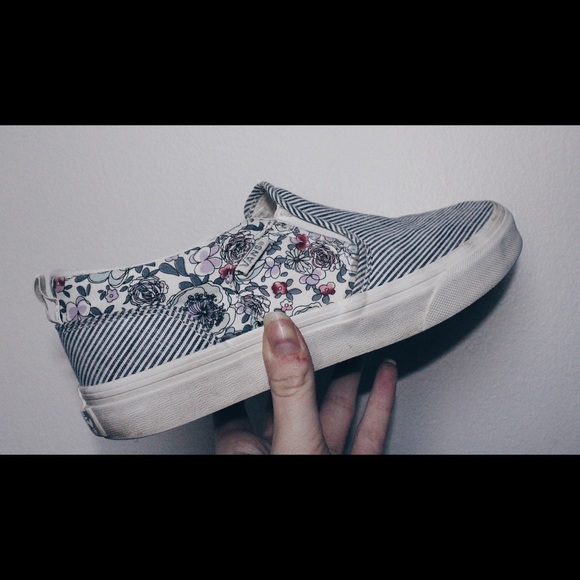 vans with flowers on the side